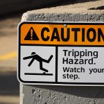 caution tripping hazard sign